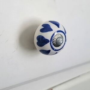 (4) Ceramic cabinet knobs or drawer pulls